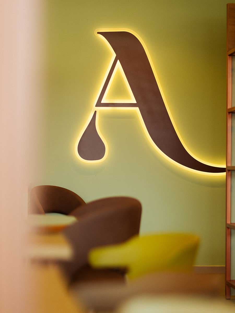 Amletina azienda insegna logo